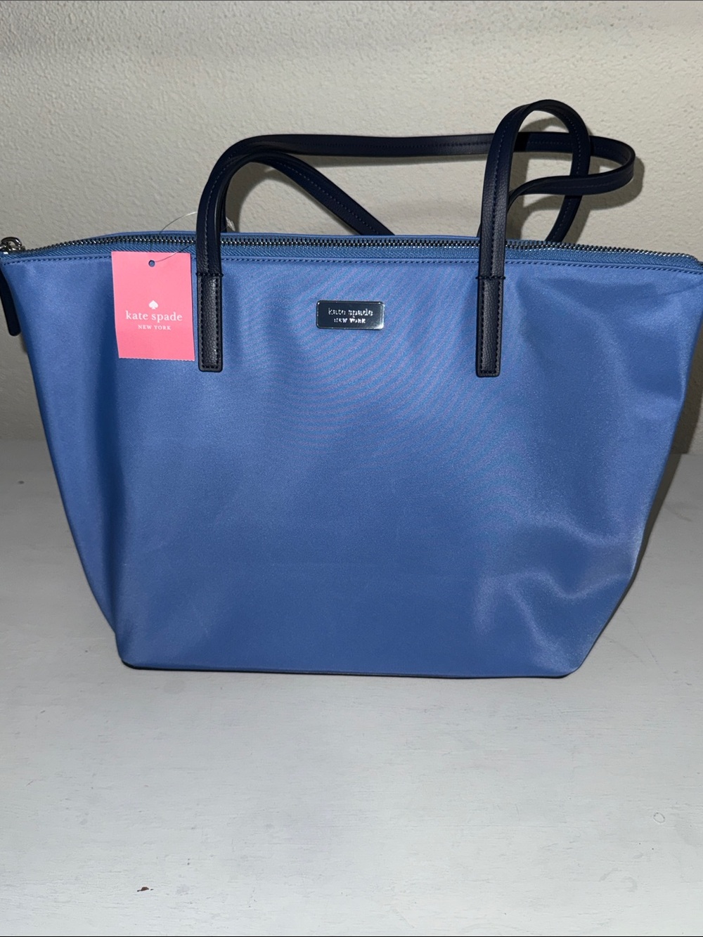 kate spade blue tote with black handles